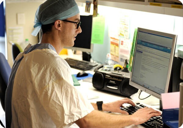 Doctor at Sydney Children's Hospital using a computer Doctor at Sydney Children's Hospital using a computer