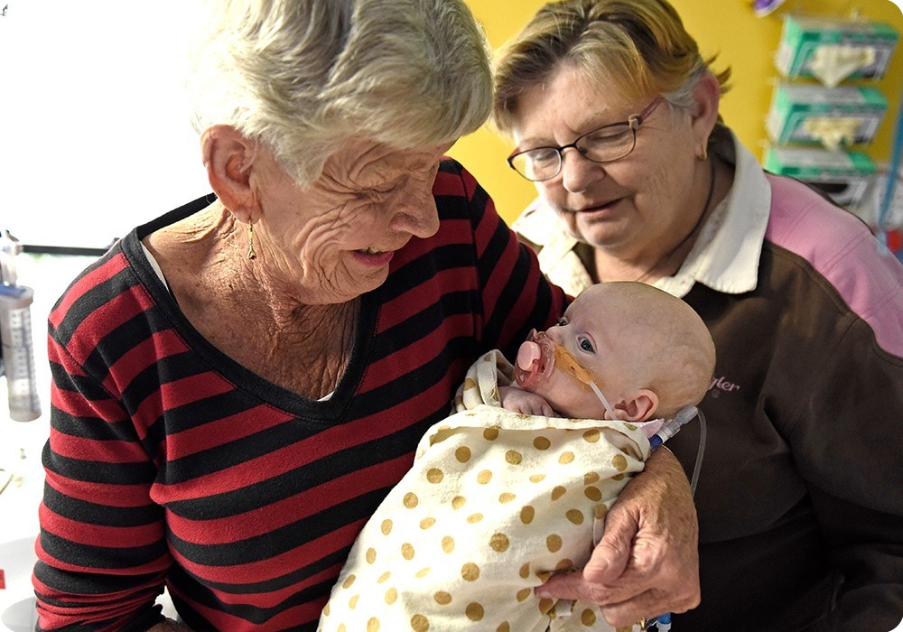 Grandmother holding newborn - Sydney Children's Hospital Foundation Grandmother holding newborn - Sydney Children's Hospital Foundation